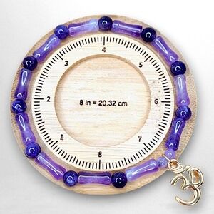 Amethyst AA Grade Gemstone 8 Inch Stretch Bracelet With An Ohm Charm